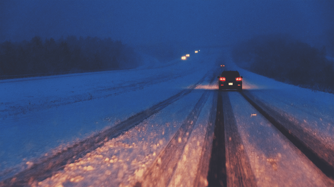 driving on the highway during winter storm